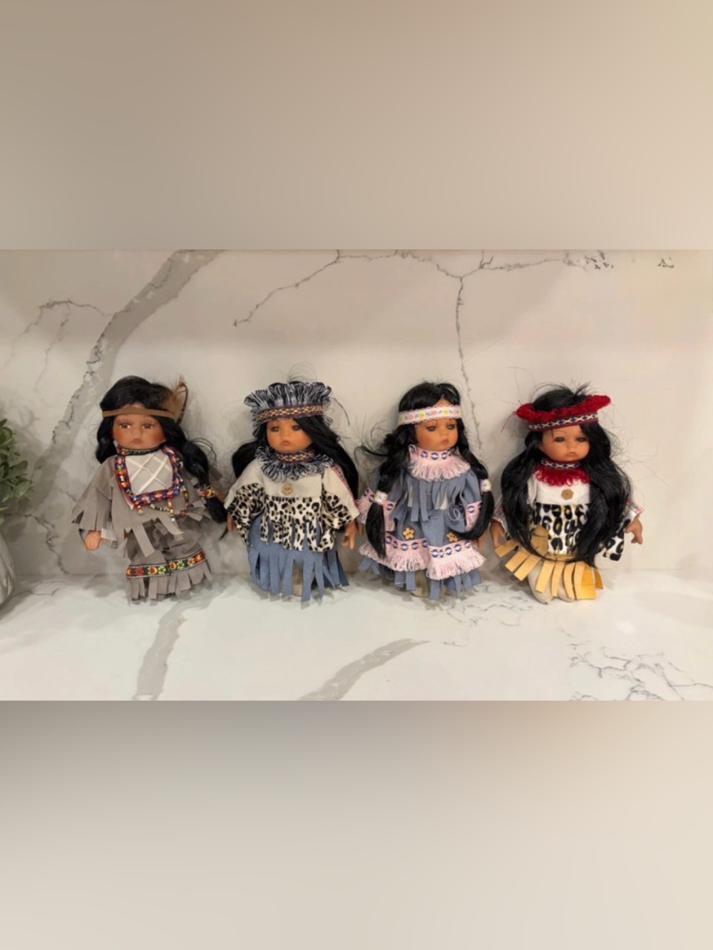 Vintage 1990s Native American
Style Porcelain Dolls Lot of 4
Beaded Suede Outfit